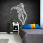 Fototapeta Astronauta na deskorolce w kosmosie.