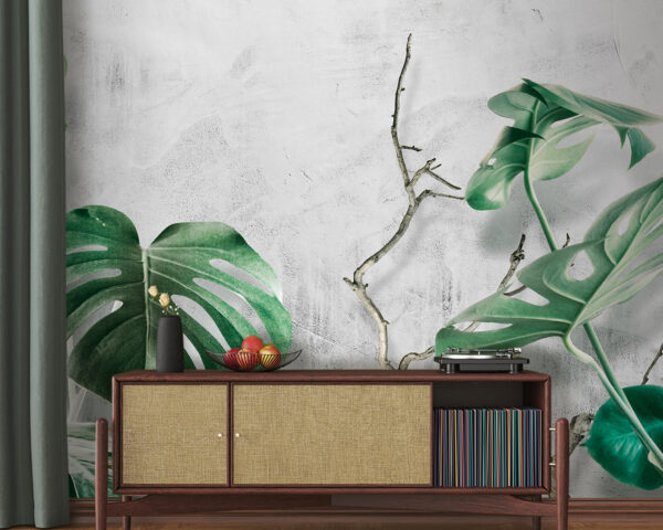 Fototapeta Zielone liście na tle teksturowanej ściany