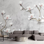 Fototapeta Delikatne magnolie na eleganckich gałęziach.