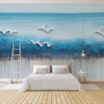 Fototapeta Obraz ptaków lecących nad błękitnym oceanem