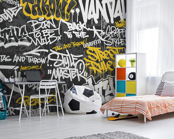 Żółte graffiti na czarnym tle Fototapeta Żółte graffiti na czarnym tle