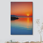 Obraz Canvas prints Sunset over a body of water