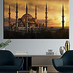 Obraz Duży budynek z wieżami i wieżyczkami