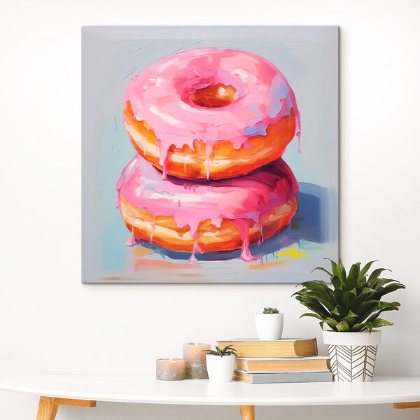 Dwa pączki z różowym lukrem Obraz Dwa pączki z różowym lukrem