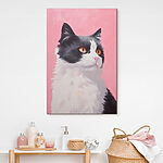 Obraz Czarno-biały kot z pomarańczowymi oczami