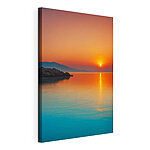Wydruk na płótnie Canvas prints Sunset over a body of water